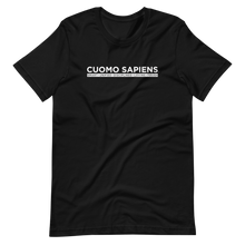 Load image into Gallery viewer, A black unisex t-shirt lying wrinkled on a flat surface, featuring the Cuomo Sapiens S.U.D.L.T. graphic in white.