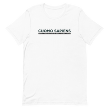 Load image into Gallery viewer, A white unisex t-shirt on a flat surface, featuring the Cuomo Sapiens S.U.D.L.T. graphic in black.