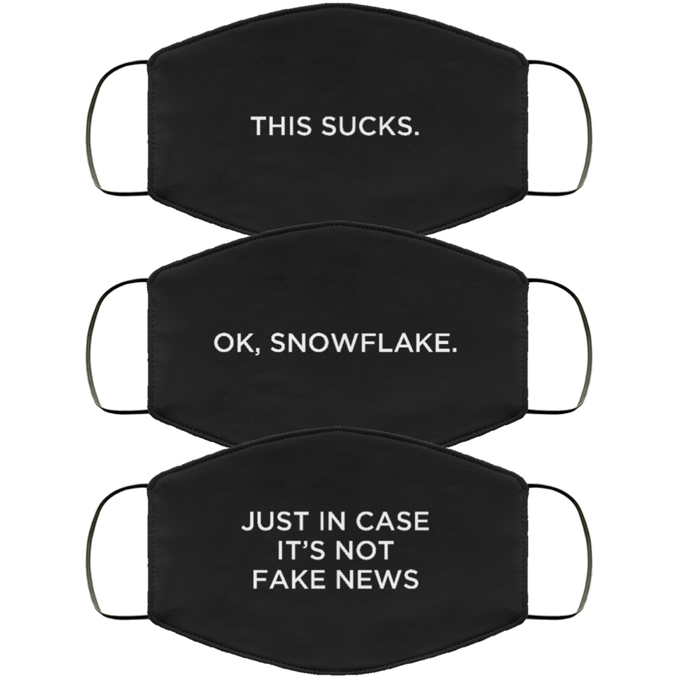 Three vertically-stacked face masks in black, with white type. The first one reads, ‘This Sucks.' The second one reads, 'OK, Snowflake.' And the third one reads, 'Just in case it's not fake news.'