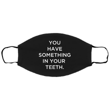 Load image into Gallery viewer, Cuomo Sapiens 3-ply protective face mask, in black, featuring white type that reads &#39;You have something in your teeth.&#39;
