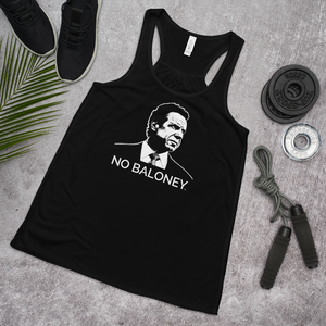 A women's flowy, racerback style tank top, in black, lying flat on the floor with some exercise equipment, featuring the Cuomo Sapiens NO BALONEY graphic in white.