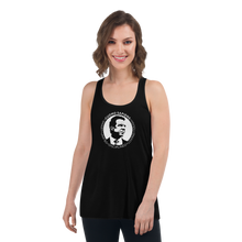 Load image into Gallery viewer, Woman wearing a black flowy racerback style tank top, featuring the Cuomo Sapiens S.U.D.L.T. SEAL graphic in white.
