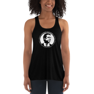 Woman wearing a black flowy racerback style tank top, featuring the Cuomo Sapiens S.U.D.L.T. SEAL graphic in white.