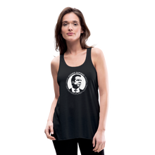 Load image into Gallery viewer, Woman wearing a black flowy racerback style tank top, featuring the Cuomo Sapiens S.U.D.L.T. SEAL graphic in white.
