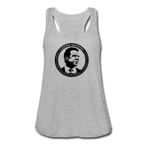 A women’s flowy, racerback style tank top, in white, on a transparent body form, featuring the Cuomo Sapiens S.U.D.L.T. SEAL graphic in black.