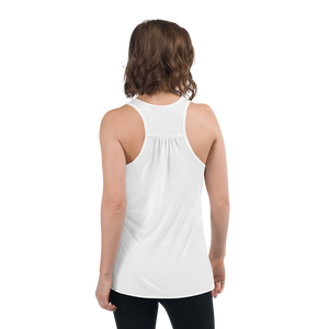 Back-view of a woman wearing a white flowy racerback style Cuomo Sapiens tank top.