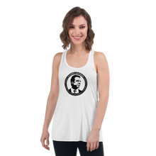 Load image into Gallery viewer, Woman wearing a white flowy racerback style tank top, featuring the Cuomo Sapiens S.U.D.L.T. SEAL graphic in black.
