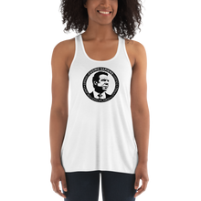 Load image into Gallery viewer, Woman wearing a white flowy racerback style tank top, featuring the Cuomo Sapiens S.U.D.L.T. SEAL graphic in black.
