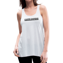 Load image into Gallery viewer, Woman wearing a white flowy racerback style tank top, featuring the Cuomo Sapiens S.U.D.L.T. graphic in black.
