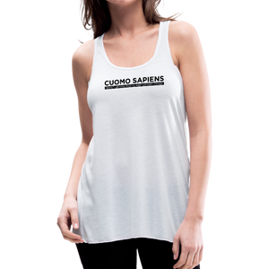 Woman wearing a white flowy racerback style tank top, featuring the Cuomo Sapiens S.U.D.L.T. graphic in black.