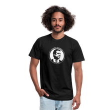 Load image into Gallery viewer, Man wearing a black unisex t-shirt, featuring the Cuomo Sapiens S.U.D.L.T. SEAL graphic in white.
