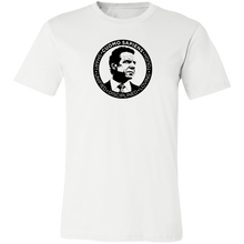 Load image into Gallery viewer, A white unisex t-shirt on a transparent body form, featuring the Cuomo Sapiens S.U.D.L.T. SEAL graphic in black.
