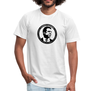 Man wearing a white unisex t-shirt, featuring the Cuomo Sapiens S.U.D.L.T. SEAL graphic in black.