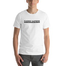 Load image into Gallery viewer, Man wearing a white unisex t-shirt, featuring the Cuomo Sapiens S.U.D.L.T. graphic in black.
