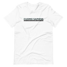 Load image into Gallery viewer, A white unisex t-shirt lying wrinkled on a flat surface, featuring the Cuomo Sapiens S.U.D.L.T. graphic in black.
